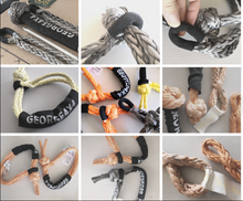 Load image into Gallery viewer, Soft Shackles are an alternative to traditional steel shackles and are made of Synthetic rope (well known as Dyneema/Spectra etc). They are Lighter, Stronger, and more flexible. Button knot Soft Shackle*1pc Hand spliced in Australia, Tested by NATA-accredited lab Super lightweight, can float in water UV-resistant, waterproof and more durable Protective sleeve fitted Black eye