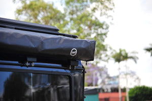 GEORGE4X4 270 Free Standing Awning perfect for smaller vehicles like the Suzuki Jimny, Jeep Wrangler, and Defender 90
Built-in LED Lighting: Illuminate your campsite with integrated LED lights powered by a 5m USB cable. Optimal Dimensions: 2m length with a 2m radius—small enough to be versatile, yet spacious enough for comfort. Durable Material: Made from rugged 280g polycotton canvas, ensuring waterproof protection and durability. Lightweight Design: Weighs only 23kg, making it easy to transport and set up