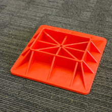 Load image into Gallery viewer, Heavy Duty Hi-Lift Accessory Jack Plate Base Crafted from high-quality polyethylene, this jack plate base is built to last and withstand the toughest conditions (sand, mud, grass, or soft ground). Features: Material: High-quality Polyethylene Colour: Orange-red Base Size: 29.5cm x 29.5cm Compatible with Jack Factory Base: 18.7cm x 11.9cm (approx.) Extra heavy-duty support and UV-resistant Non-slip textured patterns for optimal grip