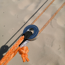 Load image into Gallery viewer, A Snatch pulley ring is an ideal alternative to a traditional snatch block. It&#39;s designed to fit soft shackles and synthetic winch ropes. It&#39;s lighter, smaller, and safer with no sharp edges. Curved surface and wider groove, less friction to ropes and soft shackles. Lighter, safer and more durable. Breaking strength 11000kg, strictly tested in Australia by NATA-certified lab Solid aluminium machined and polished Outer diam 100mm, inner diam 30mm Rope running 8mm to 14mm, 0.40kg 
