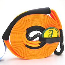 Load image into Gallery viewer, To rescue a vehicle stuck in sand or mud, use a snatch strap, which can stretch 10-20% under load and stores kinetic energy. George4x4 snatch straps are made of top quality 100% nylon Highly elastic that can be elongated up to 20% UV-resistant, waterproof and more durable Both ends have reinforced eyelets Comes with 2pcs removable sleeves VISIBLE colour-orange. 8000kg*9m