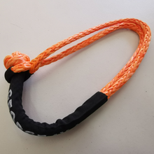 Load image into Gallery viewer, Soft Shackles are an alternative to traditional steel shackles and are made of Synthetic rope (well known as Dyneema/Spectra etc). They are Lighter, Stronger, and more flexible. Button knot Orange Soft Shackle*1pc Hand spliced in Australia, Tested by NATA-accredited lab Super lightweight, can float in water UV-resistant, waterproof and more durable Protective sleeve fitted Features: 11mm*100cm Breaking Strength: 18000kg