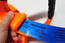 Load image into Gallery viewer, To rescue a vehicle stuck in sand or mud, use a snatch strap, which can stretch 10-20% under load and stores kinetic energy. George4x4 snatch straps are made of top quality 100% nylon Highly elastic that can be elongated up to 20% UV-resistant, waterproof and more durable Both ends have reinforced eyelets Comes with 2pcs removable sleeves. 17000kg*9m. It is designed for heavy-duty trucks or big rigs with a caravan.