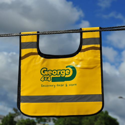 A damper, a safety blanket dampener, is commonly used in 4WD recovery to reduce the impact of potentially dangerous situations, such as the recoil of a winch cable or the sudden release of tension from a snatch strap. reducing the risk of injury or damage to the vehicle or surrounding objects. Dampers are essential safety components in 4WD recovery and should be used in all recovery situations. Yellow Safety Blanket, New design! More Visible, More Reflective Stripe