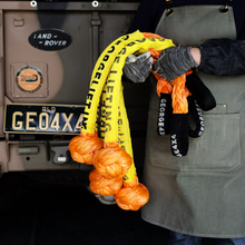 Load image into Gallery viewer, Soft Shackles are an alternative to traditional steel shackles and are made of Synthetic rope (well known as Dyneema/Spectra etc). They are Lighter, Stronger, and more flexible. Button knot Soft Shackle*1pc Hand spliced in Australia, Tested by NATA-accredited lab Super lightweight, can float in water UV-resistant, waterproof and more durable Protective sleeve fitted Features:  20mm*90cm Breaking Strength: 55000kg