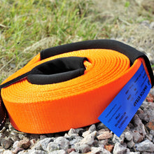 Load image into Gallery viewer, To rescue a vehicle stuck in sand or mud, use a snatch strap, which can stretch 10-20% under load and stores kinetic energy. George4x4 snatch straps are made of top quality 100% nylon Highly elastic that can be elongated up to 20% UV-resistant, waterproof and more durable Both ends have reinforced eyelets Comes with 2pcs removable sleeves VISIBLE colour-orange. 8000kg*9m